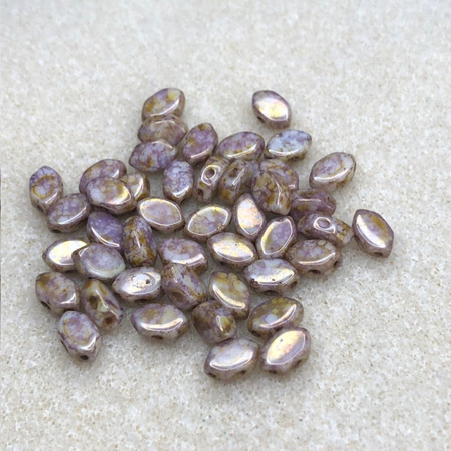 111623015 - 7x4mm Paros Par Puca-Op Mix Rose/Gold Ceramic Look