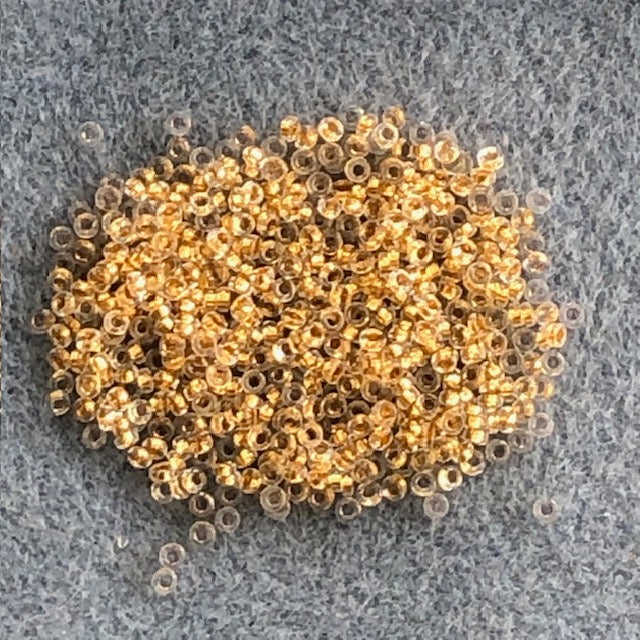0195 - 2.2mm Miyuki Spacer Bead - 24kt Gold Lined Crystal
