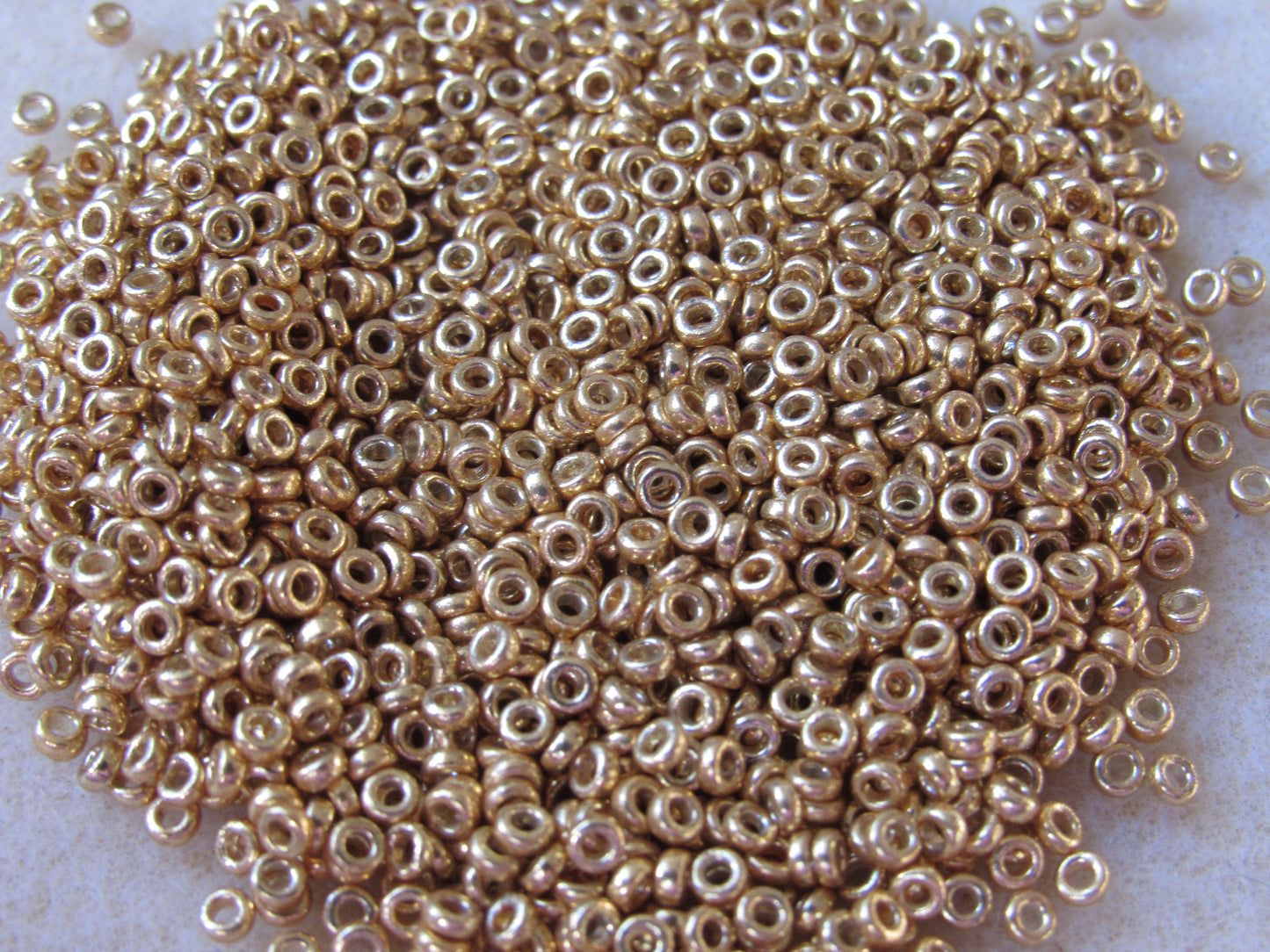 4202 - 2.2mm Miyuki Spacer Bead - DC Galv Gold