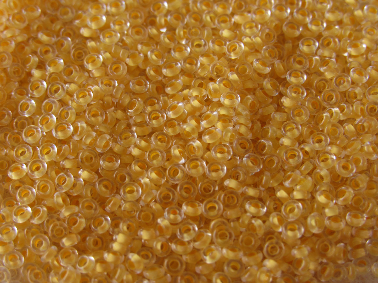 961F - 11/0 Toho Demi Round - Crystal Lined Butter