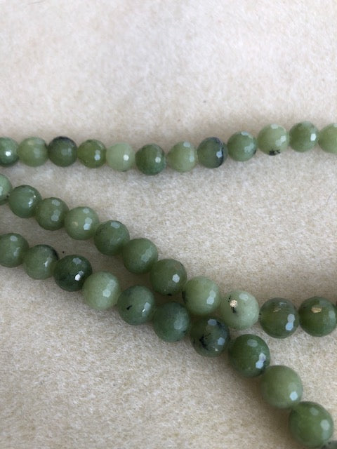 8mm Mica Heated Green Faceted Round