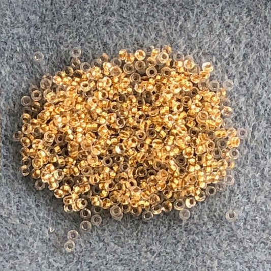 0195 - 2.2mm Miyuki Spacer Bead - 24kt Gold Lined Crystal