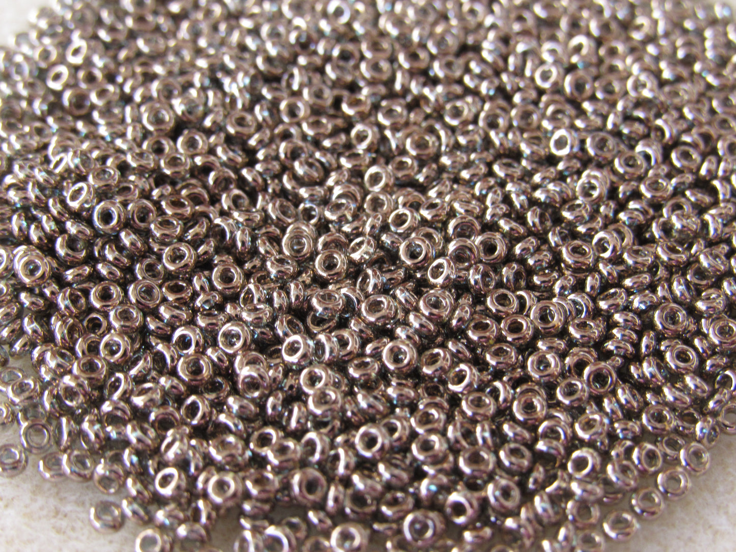 204 - 11/0 Toho Demi Round - Blue Gold Luster