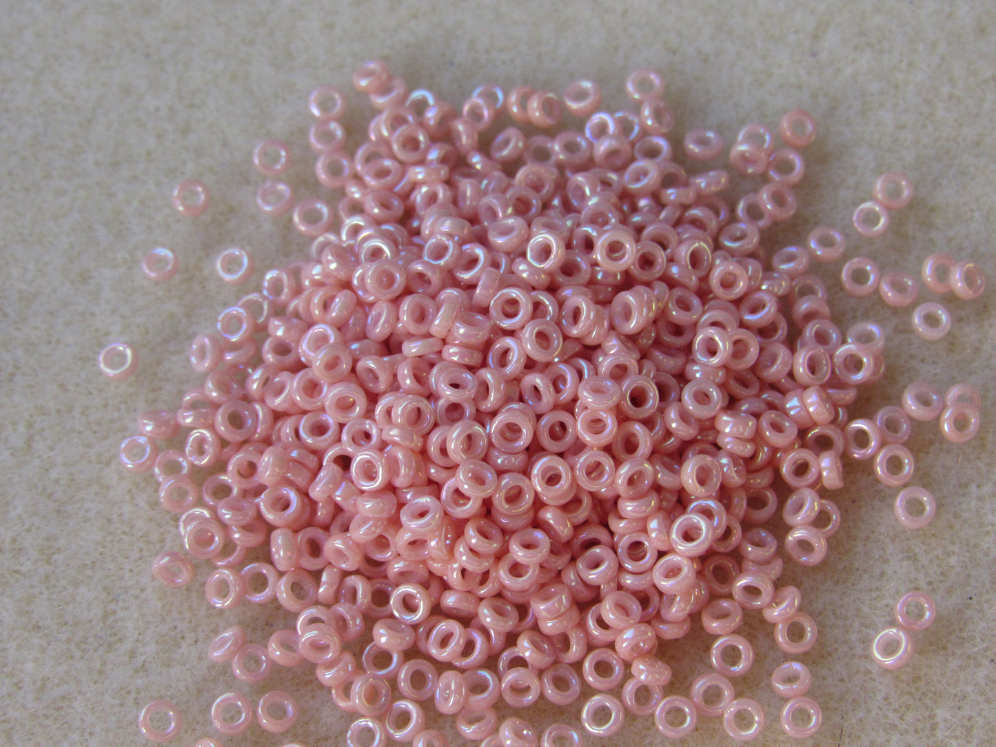 0596 - 2.2mm Miyuki Spacer Bead - Opaque Salmon Luster