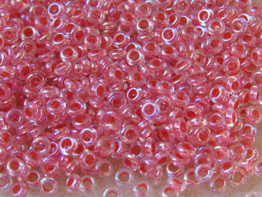 779 - 8/0 Toho Demi Round - Salmon/L Rainbow Crystal