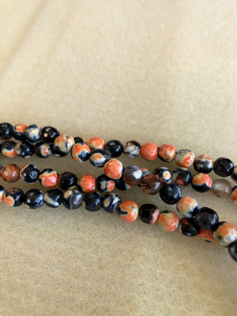 6mm Agate Dyed Orange Black Faceted Round