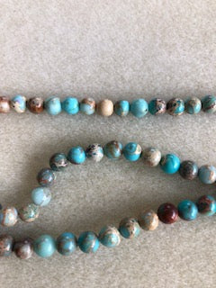 6mm Aqua Terra Jasper Dyed Blue Tan Smooth Round