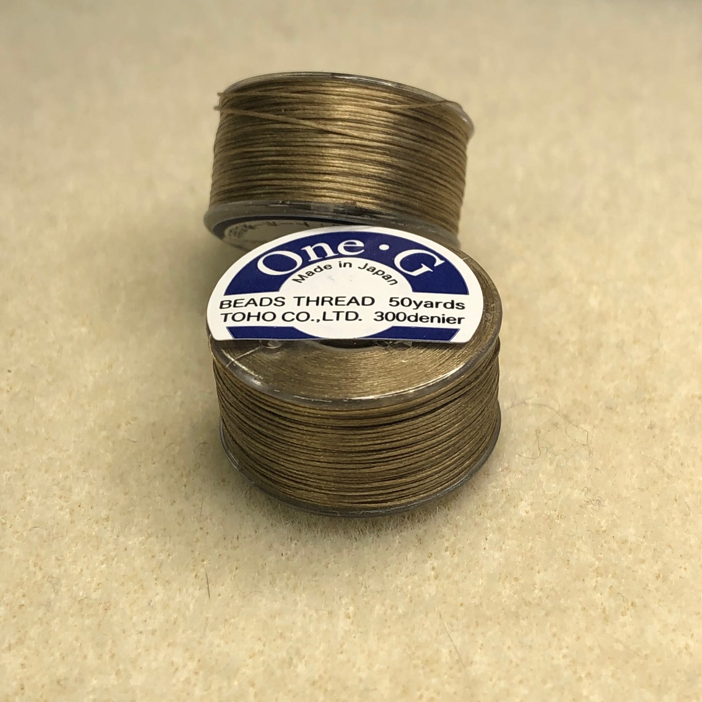 One-G Thread 50 yards-Sand Ash